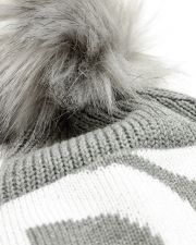 SZÜRKE NŐI KÖTÖTT SAPKA