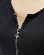 FEKETE NŐI HOSSZÚ UJJÚ CIPZÁRAS PÓLÓ